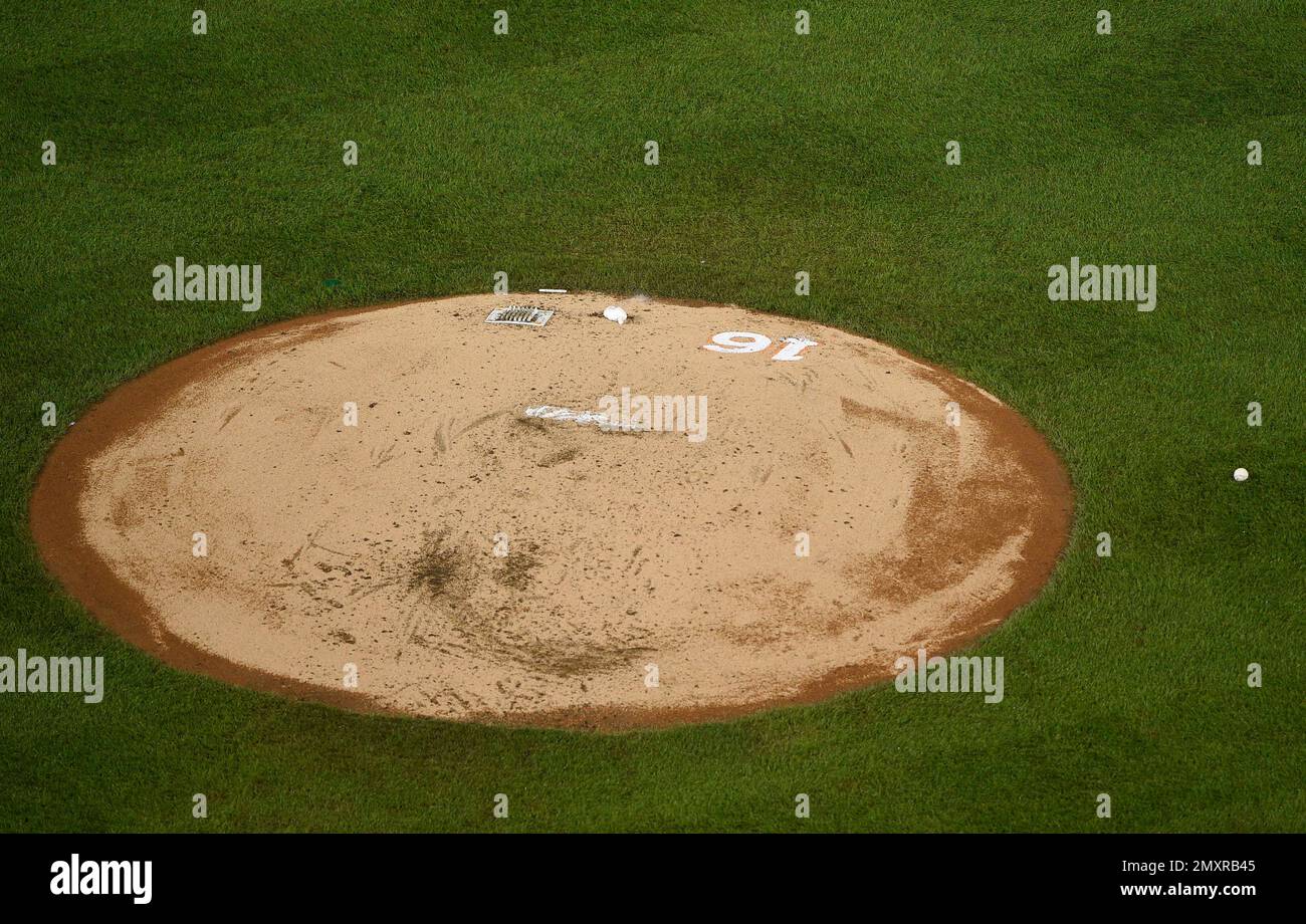 A No. 16 is displayed on the pitcher's mound in tribute of the