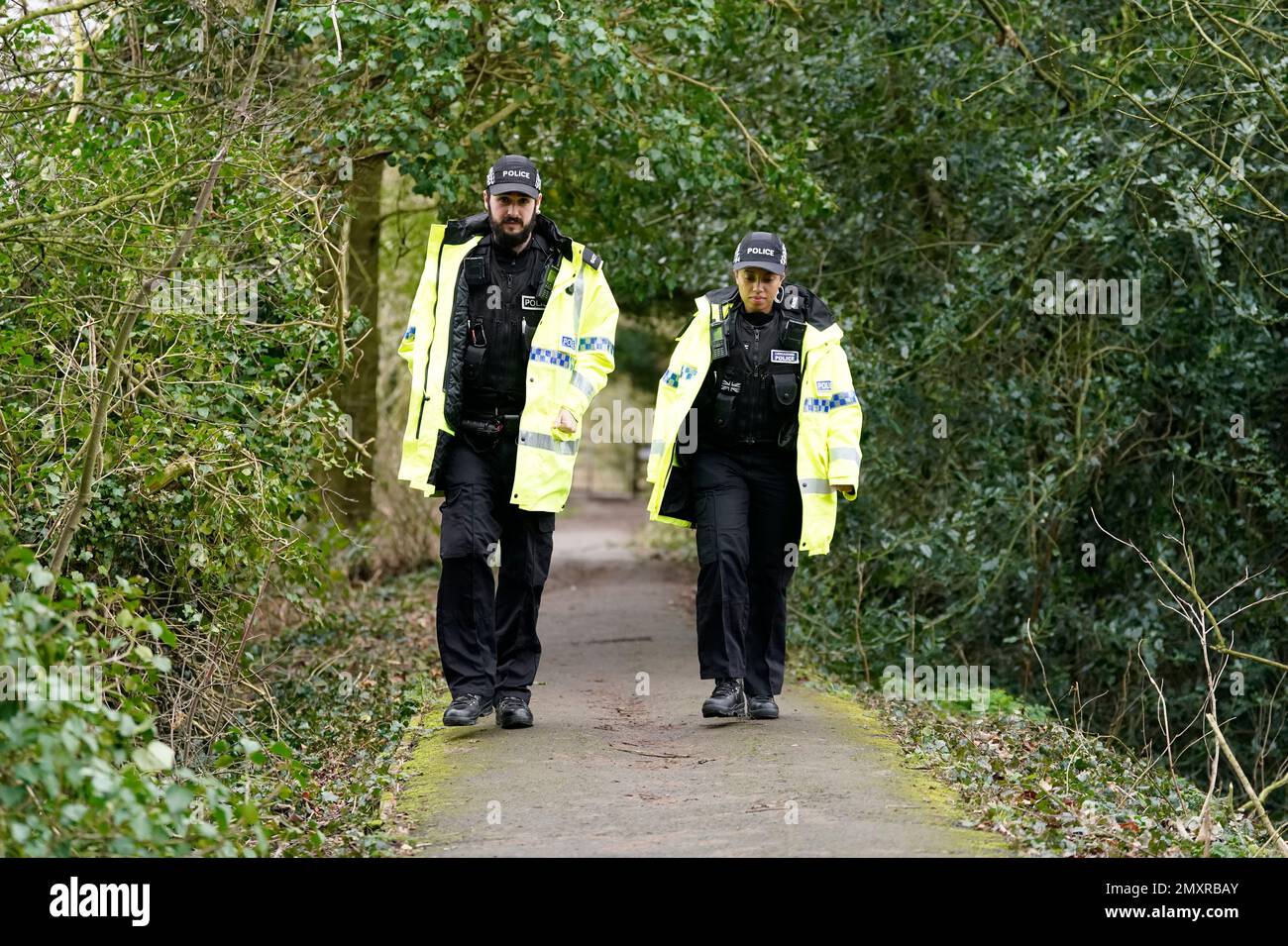 Police officers in St Michael's on Wyre, Lancashire, as police continue their search for missing woman Nicola Bulley, 45, who was last seen on the morning of Friday January 27, when she was spotted walking her dog on a footpath by the nearby River Wyre. Picture date: Saturday February 4, 2023. Stock Photo