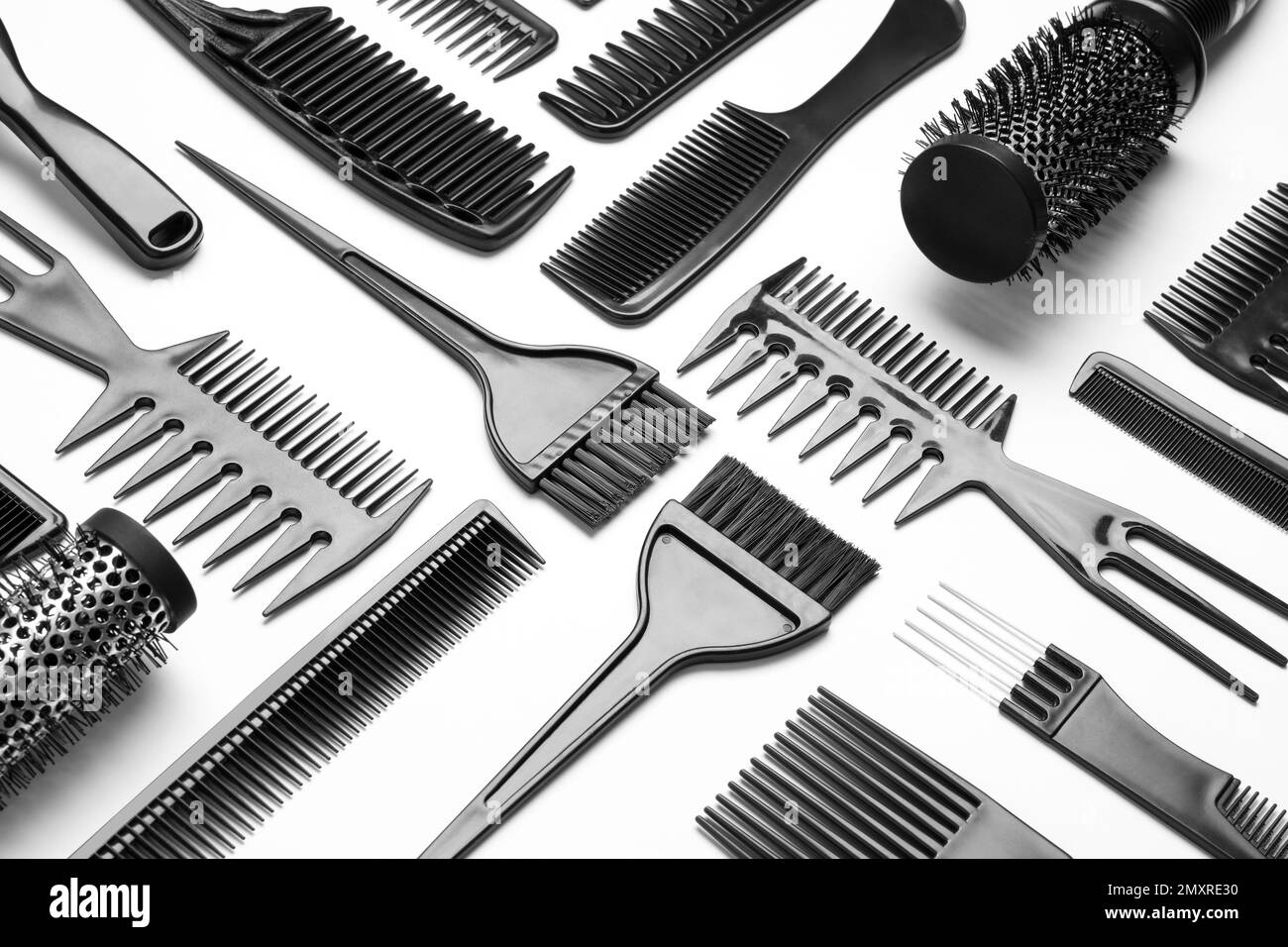 Composition with hair combs and brushes on white background Stock Photo