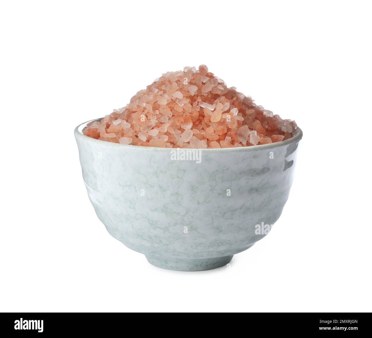 Pink himalayan salt in bowl isolated on white Stock Photo