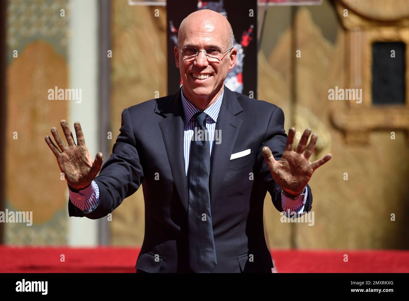 DreamWorks Animation CEO Jeffrey Katzenberg shows off his hands after ...