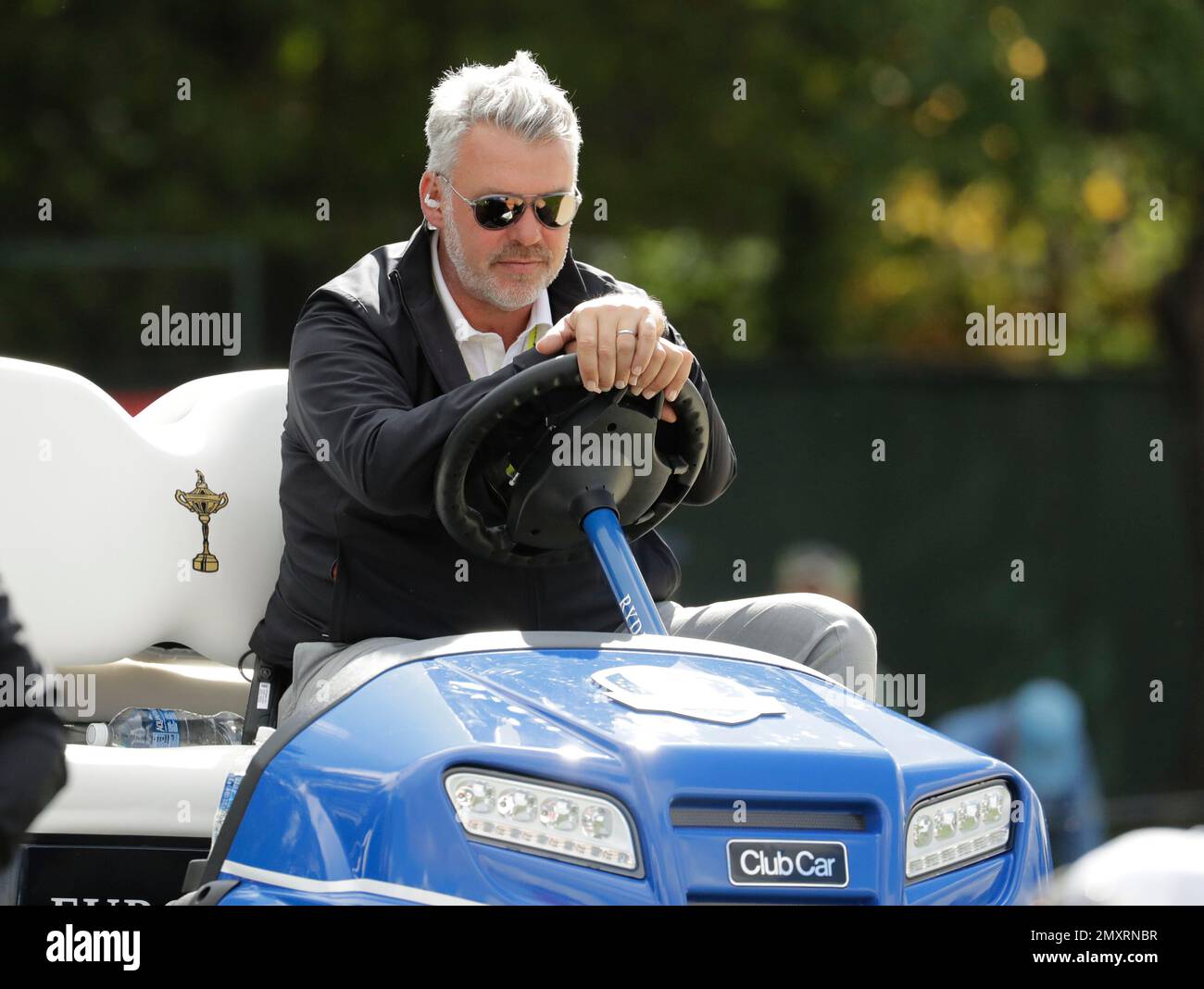 Europe captain Darren Clarke watches from a golf cart during a practice  round for the Ryder Cup golf tournament Thursday, Sept. 29, 2016, at  Hazeltine National Golf Club in Chaska, Minn. (AP