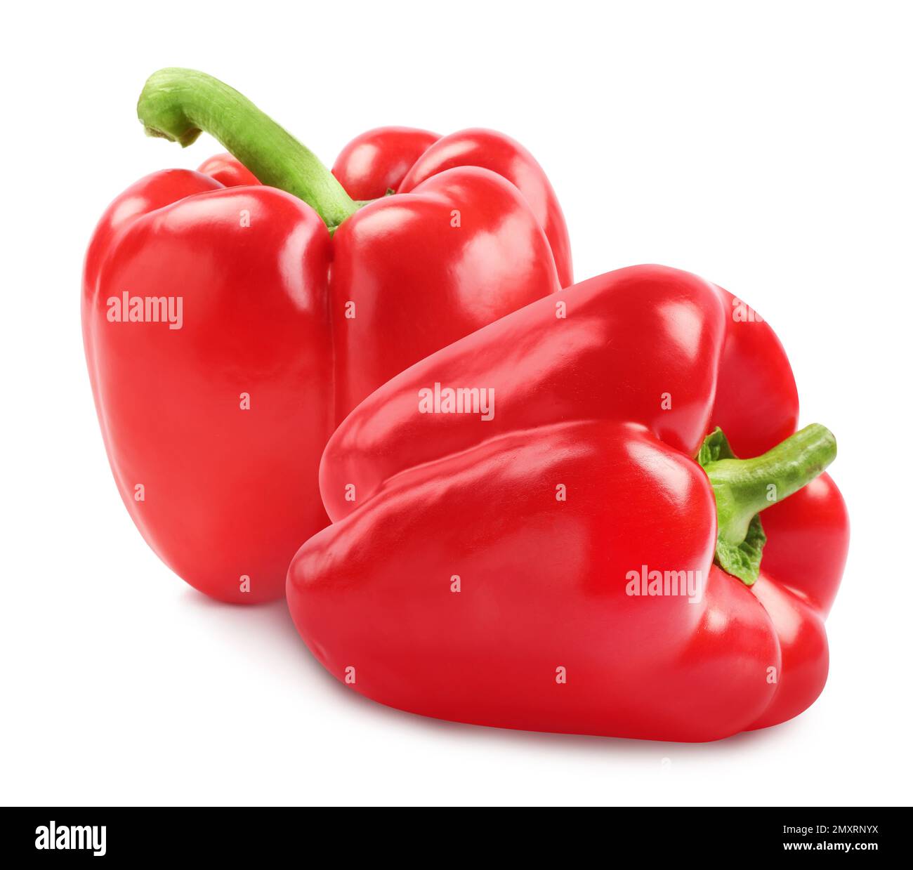 Fresh whole red bell peppers on white background Stock Photo - Alamy