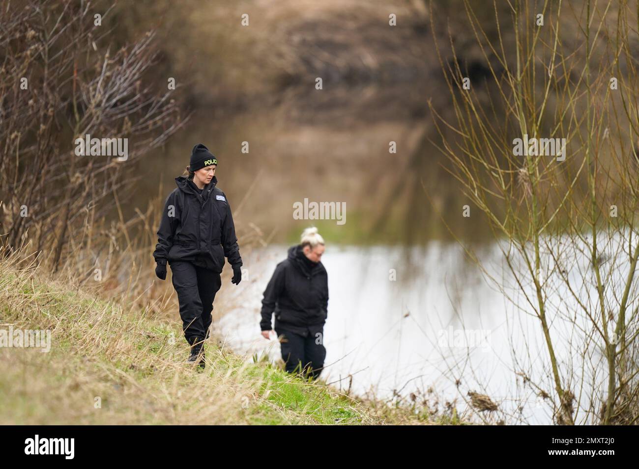 Police search teams on the banks of the River Wyre, in St Michael's on Wyre, Lancashire, as police continue their search for missing woman Nicola Bulley, 45, who was last seen on the morning of Friday January 27, when she was spotted walking her dog on a footpath by the nearby River Wyre. Picture date: Saturday February 4, 2023. Stock Photo