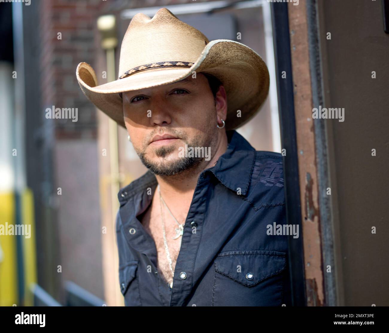In this Sept. 8, 2016 photo, country singer Jason Aldean poses for a