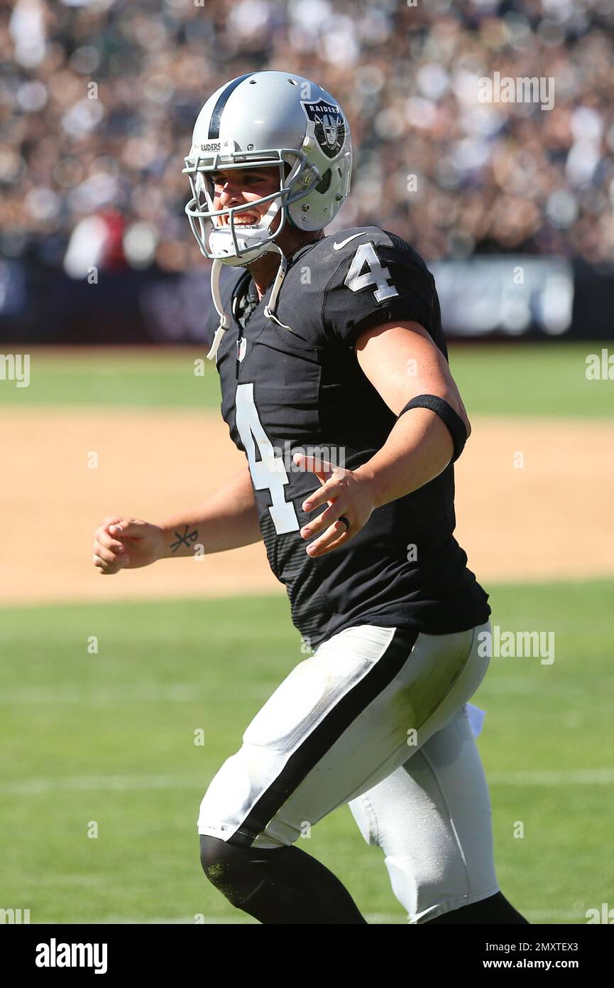 Oakland Raiders quarterback Derek Carr (4) in action against the