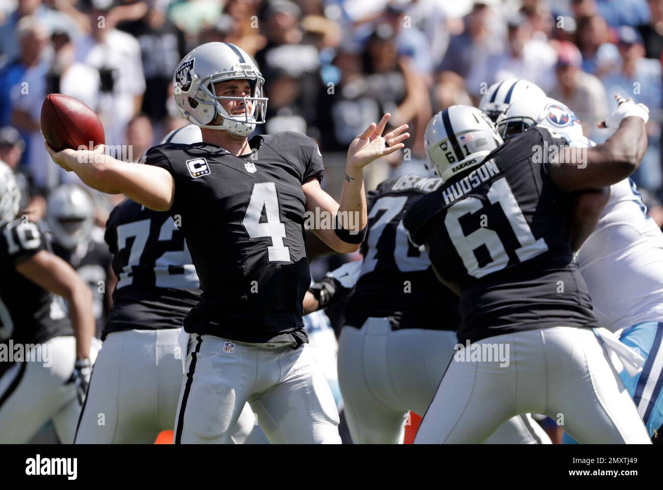 Oakland Raiders quarterback Derek Carr (4) passes against the Tennessee