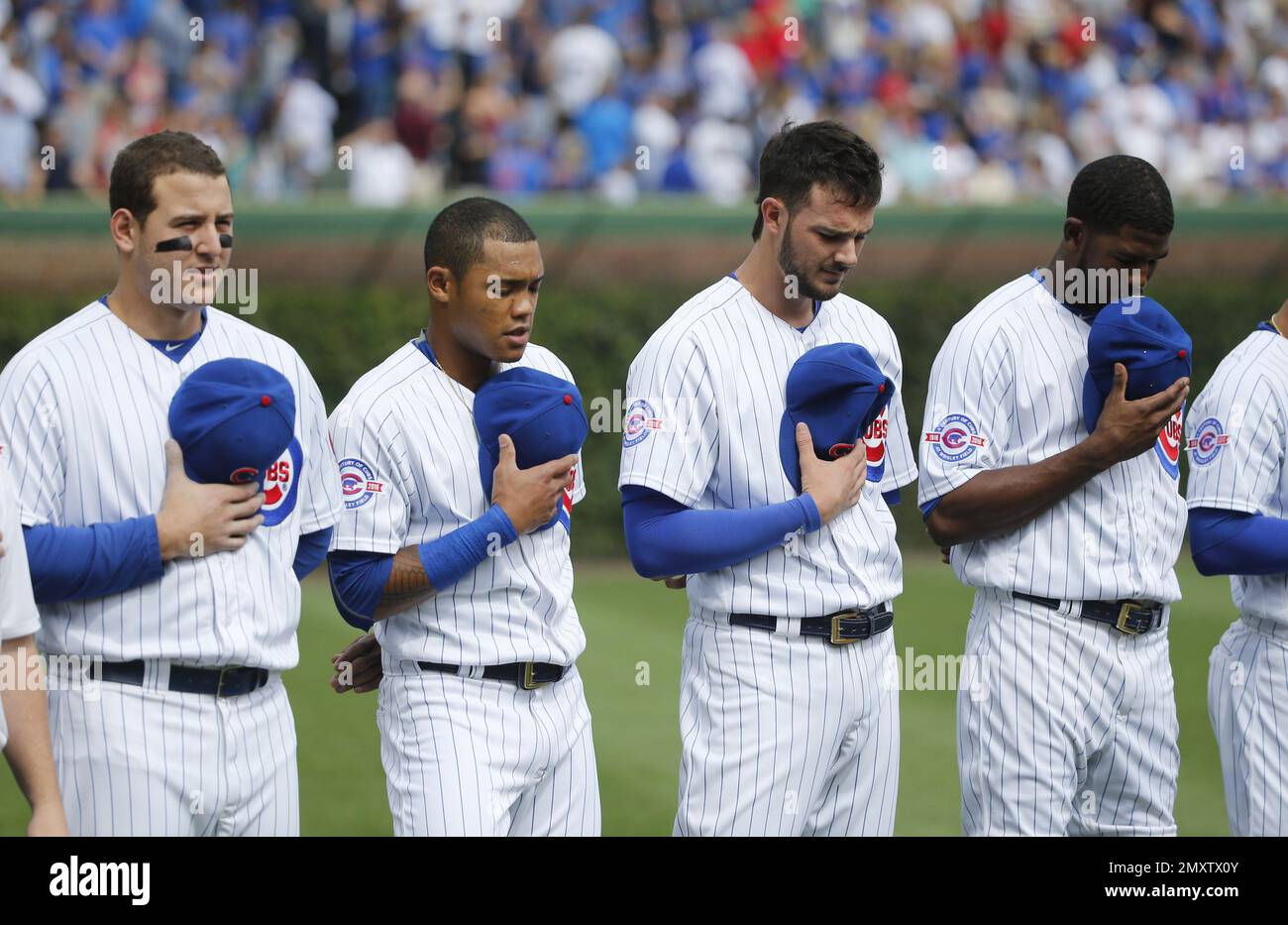 Chicago Cubs' players from left, Anthony Rizzo, Addison Russell, Kris ...