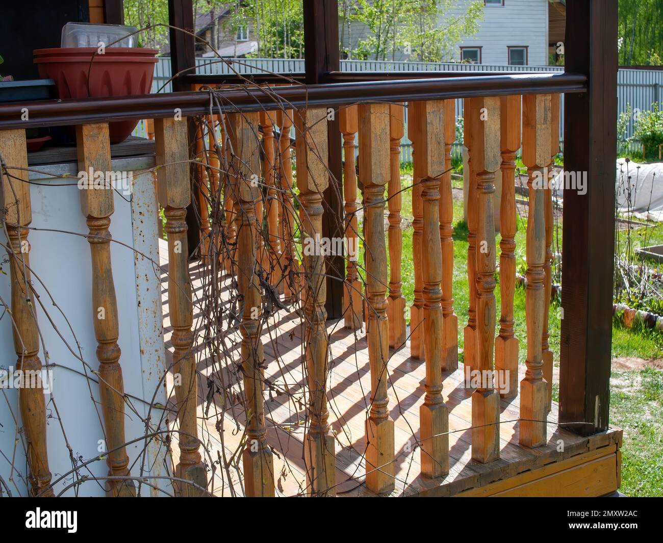 wooden fences of the village veranda, in spring Stock Photo