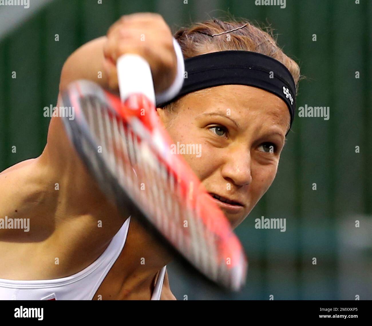 Victoria Golubic of Switzerland serves the ball to Christina Mchale of the United States during their quarter-final match of the Japan Women's Open tennis tournament in Tokyo, Friday, Sept. 16, 2016.(AP Photo/Koji Sasahara) Stock Photo