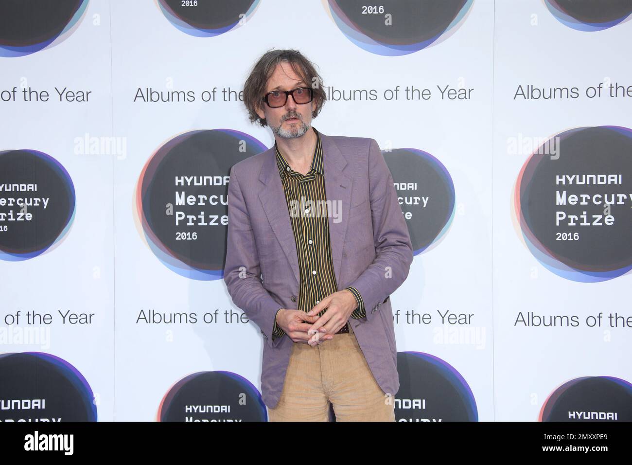 Singer Jarvis Cocker Poses For Photographers Upon Arrival At The Mercury Prize Albums Of The 1518