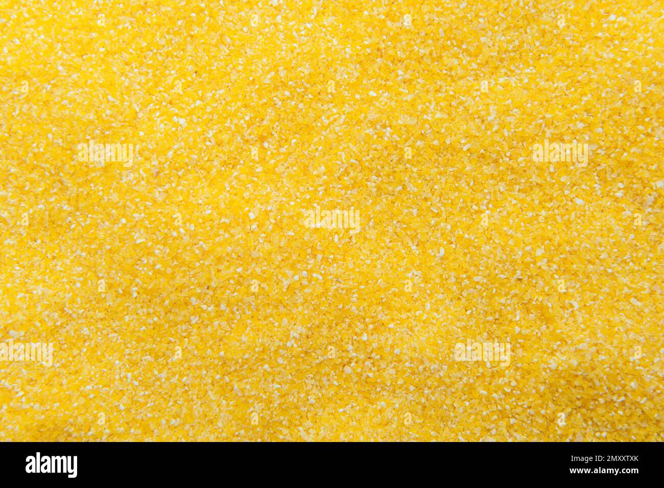 background with yellow finely ground corn grits Stock Photo Alamy