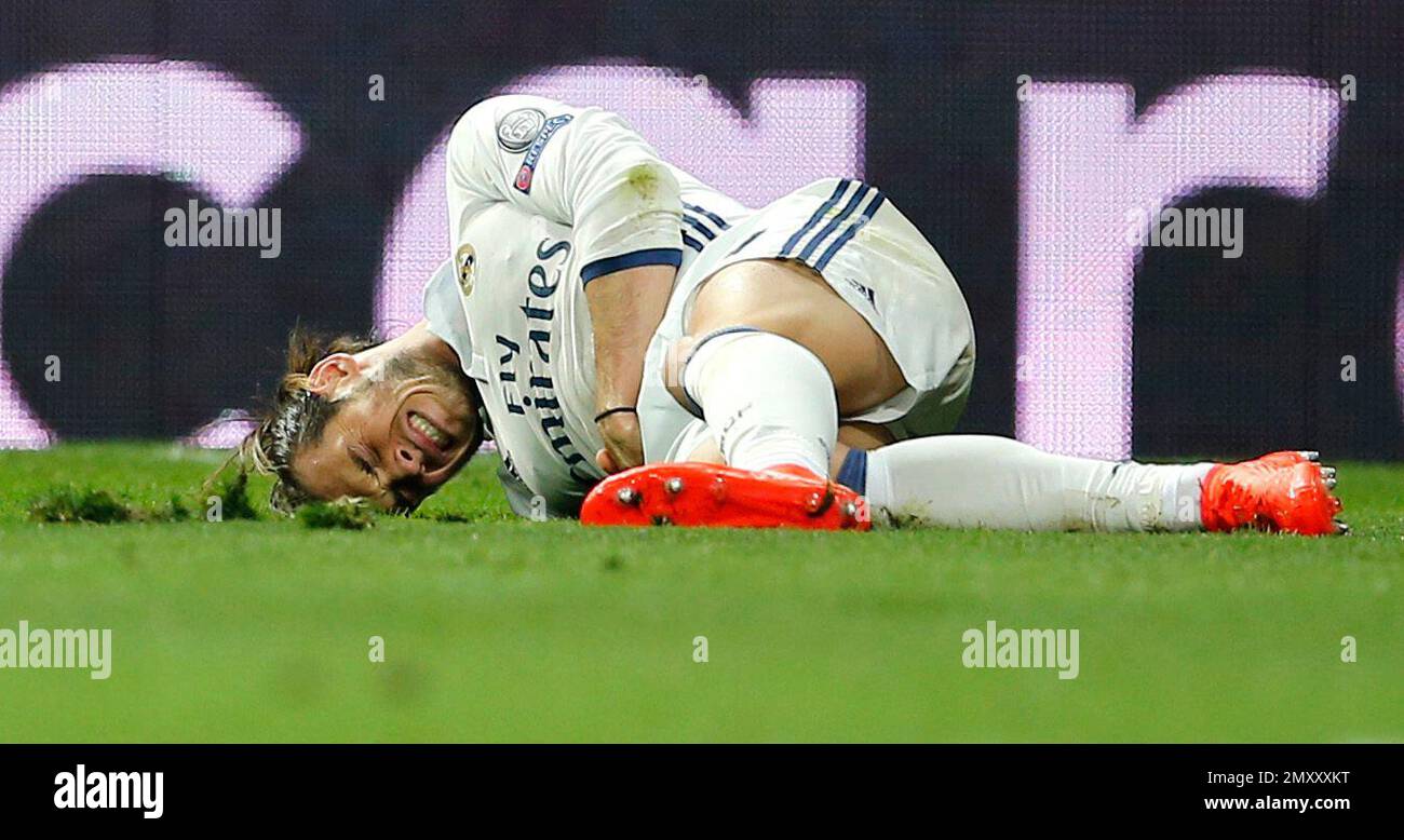 Real Madrid's Gareth Bale reacts on the ground after being injured ...
