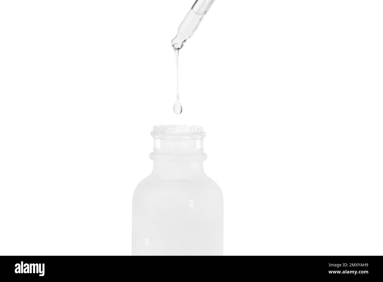 White cosmetic glass jar. Pipette with dripping outflowing liquid into a jar. Isolated on white background. Hyaluronic acid. Serum for the face. Hydra Stock Photo