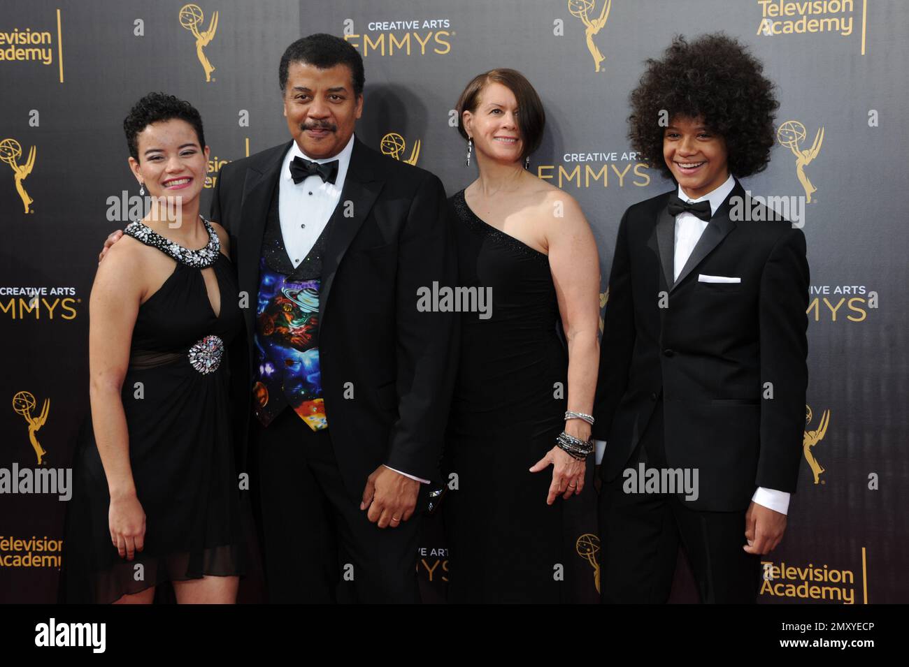Miranda Tyson, from left, Neil deGrasse Tyson, Alice Young, and Travis