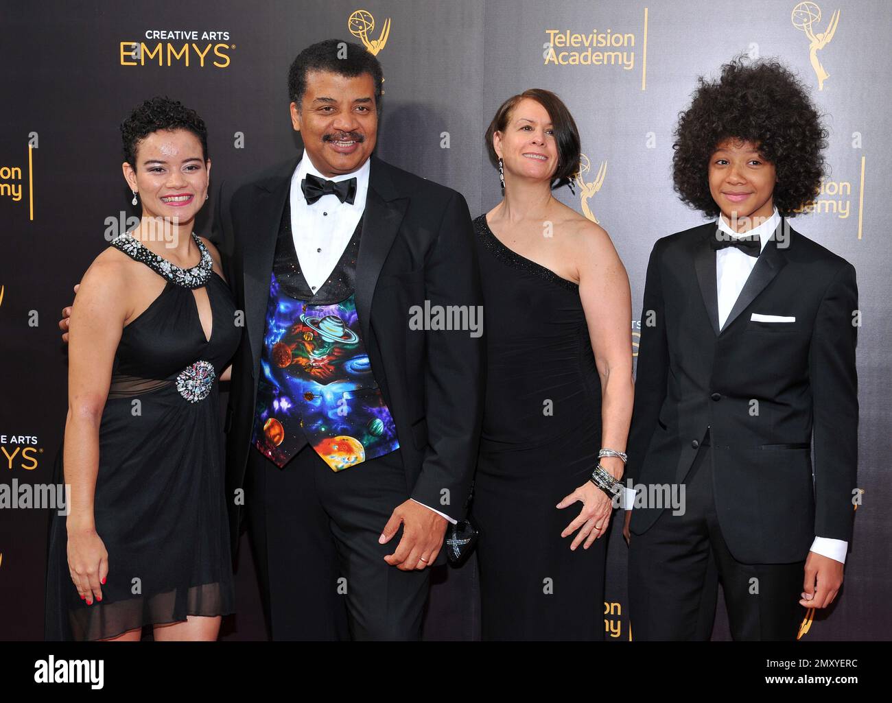 Miranda Tyson, from left, Neil deGrasse Tyson, Alice Young, and Travis