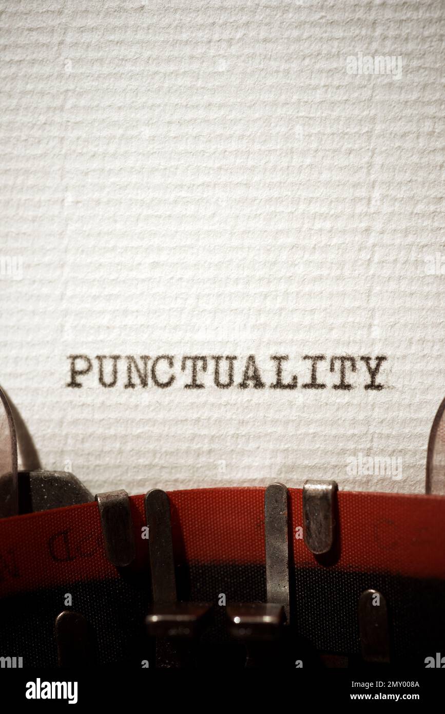Punctuality word written with a typewriter Stock Photo - Alamy