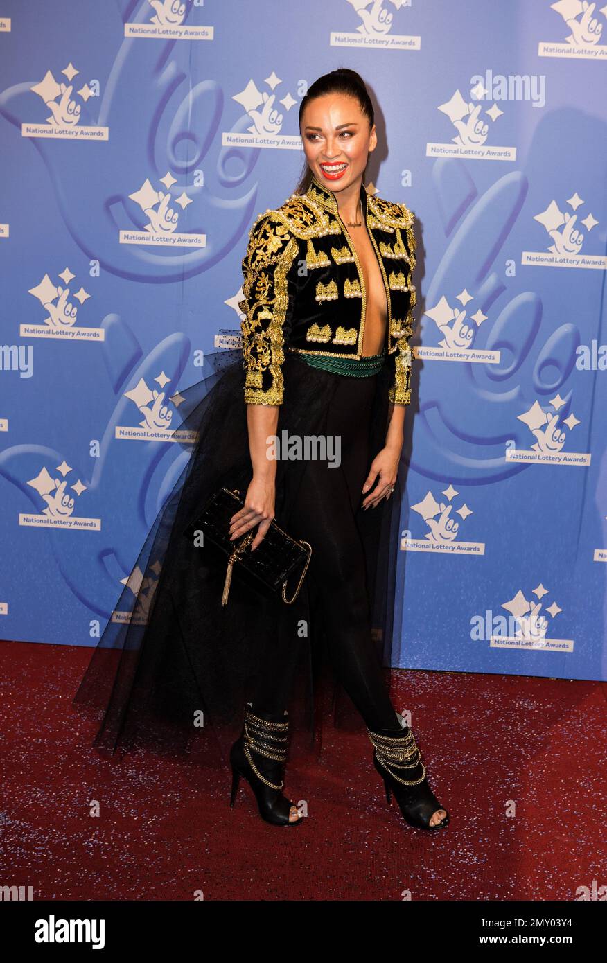 Dancer Katya Jones poses for photographers upon arrival at the National