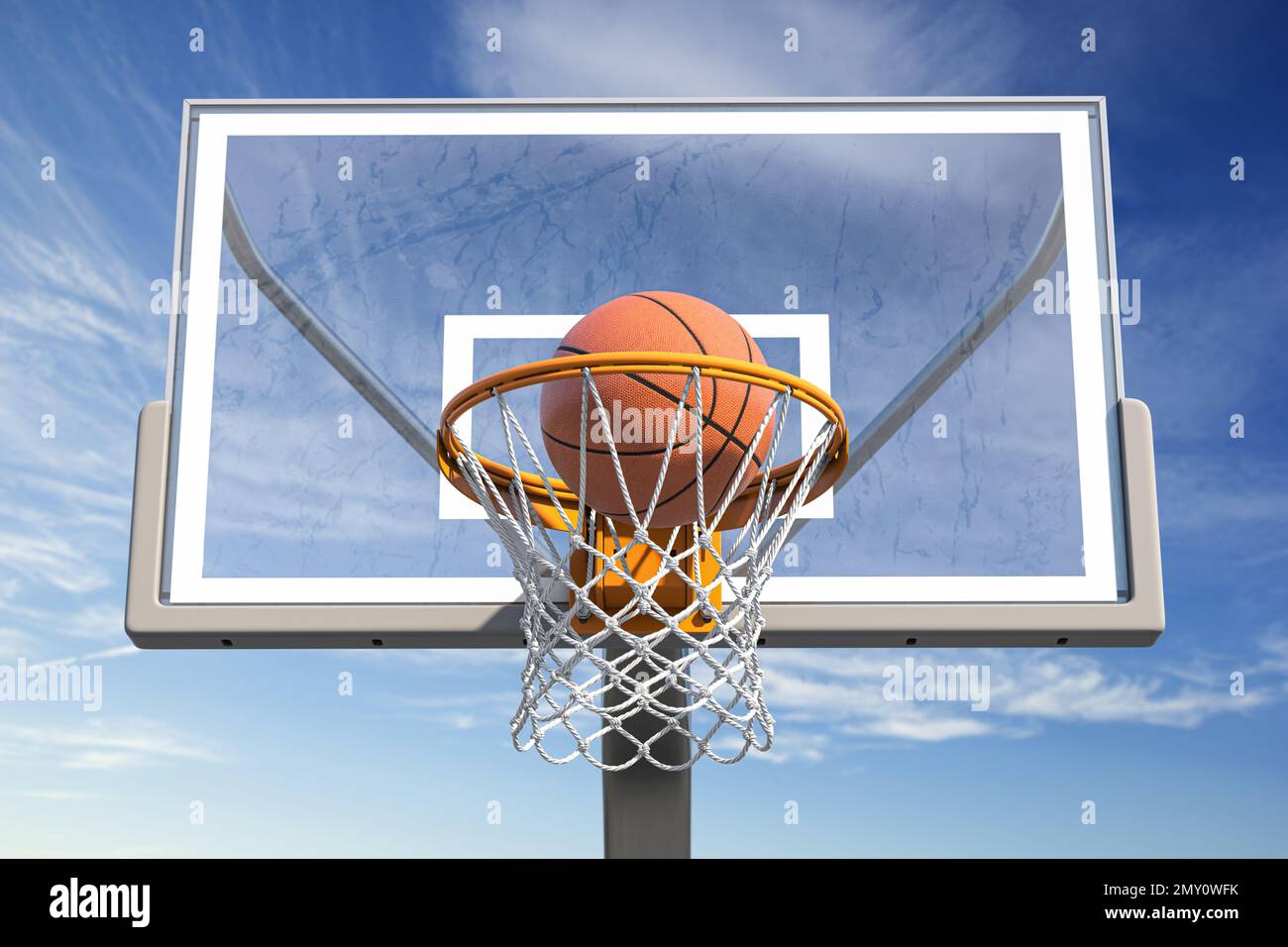 Basketball ball in tha basketball hoop on a street basketball court. 3d