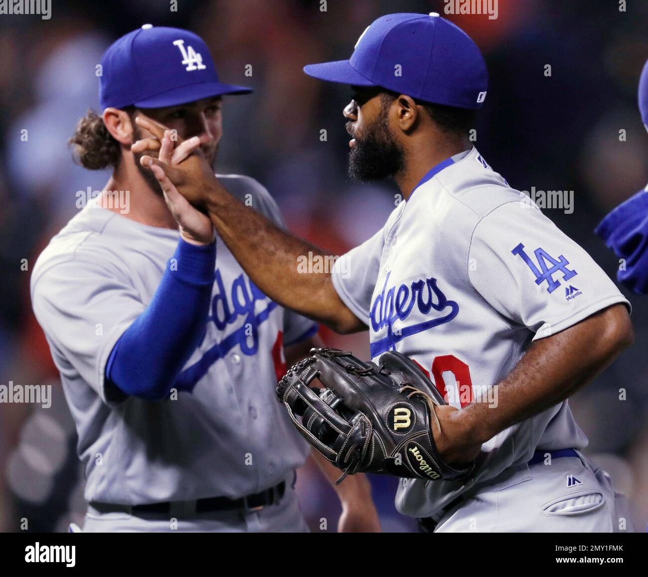 Los Angeles Dodgers shortstop Charlie Culberson, left