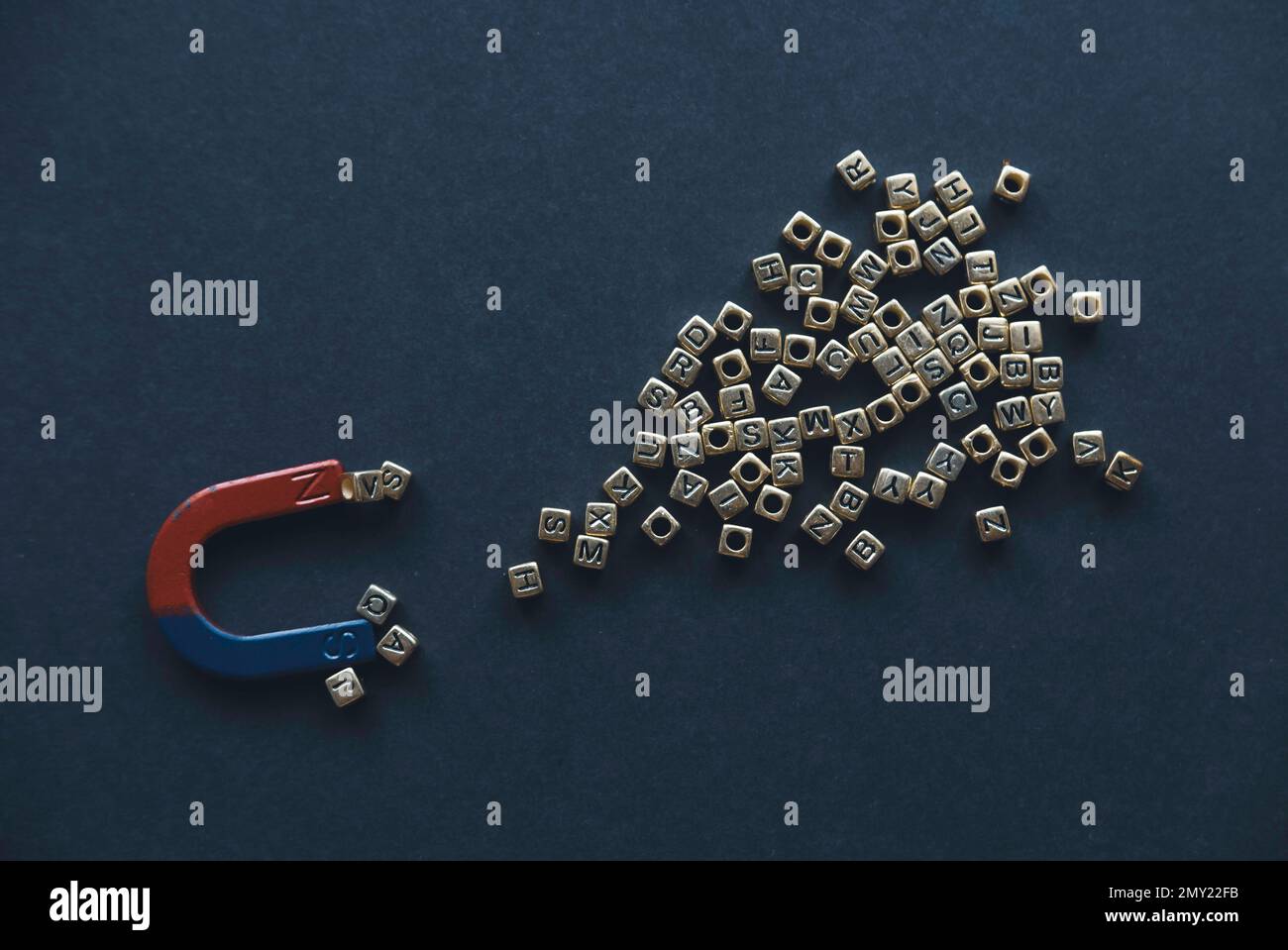 Black alphabet beads hi-res stock photography and images - Alamy