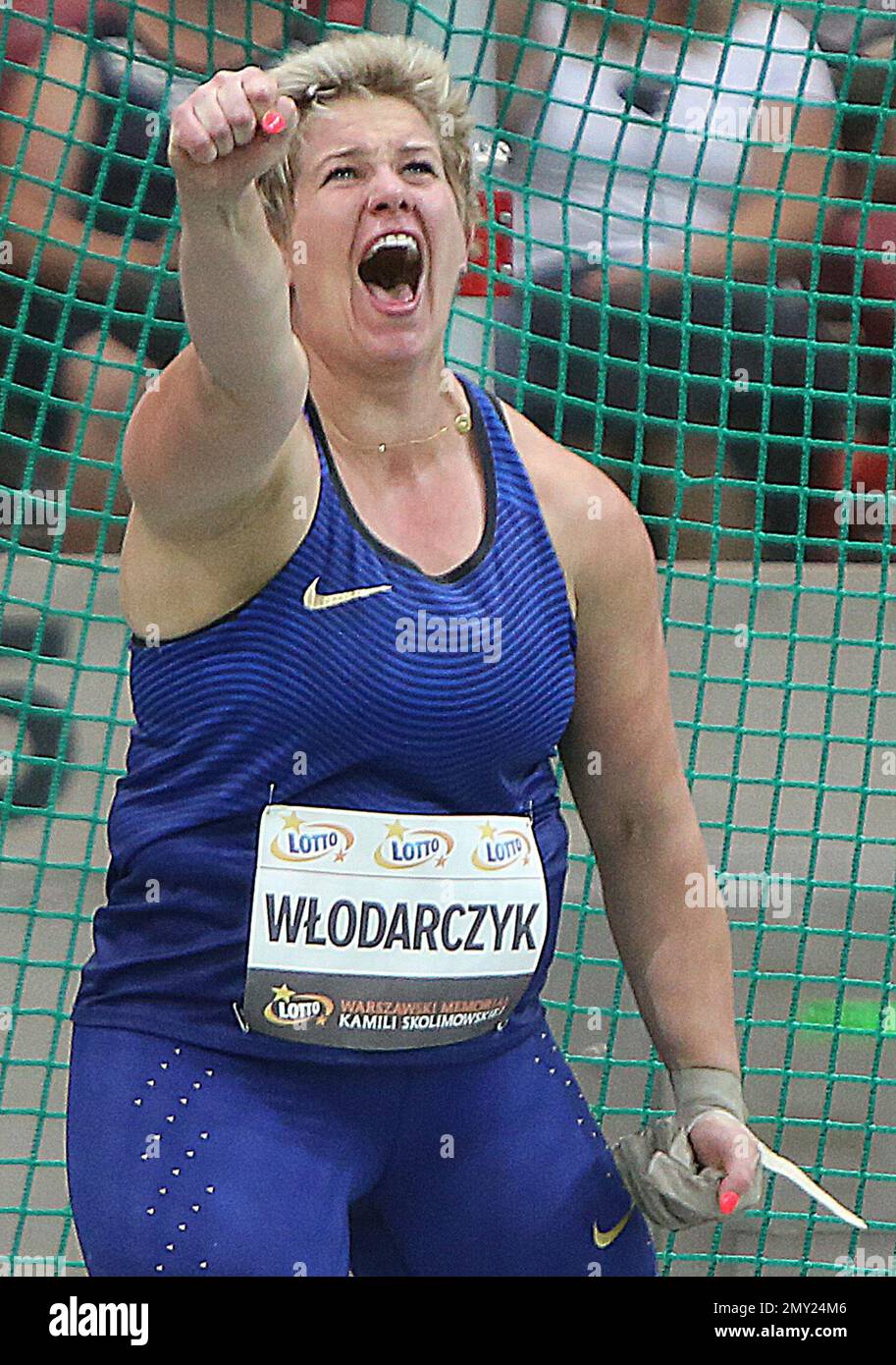 Poland's Anita Wlodarczyk celebrates a new world record in the women's