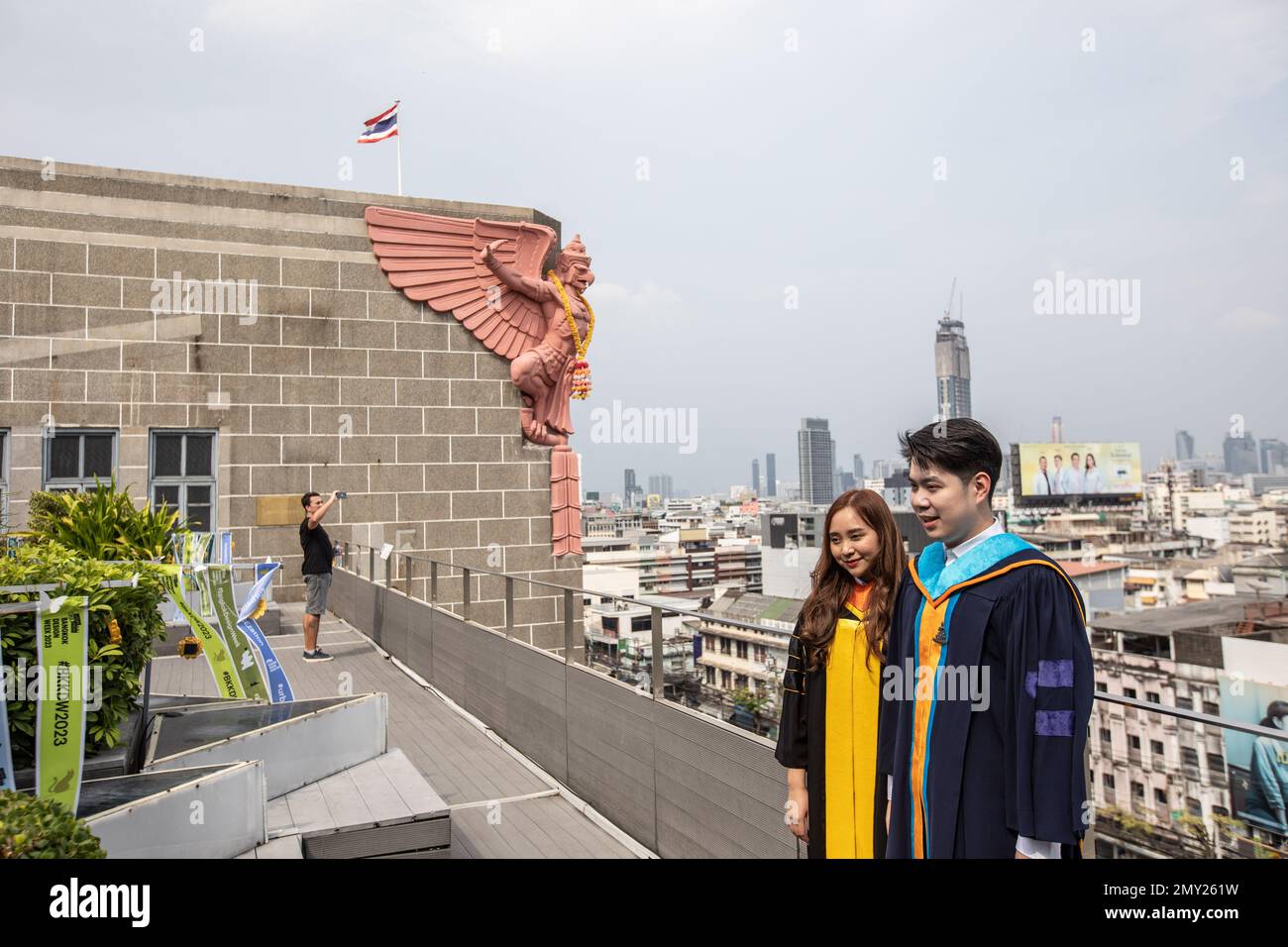 People take pictures on the rooftop of the General Post Office during