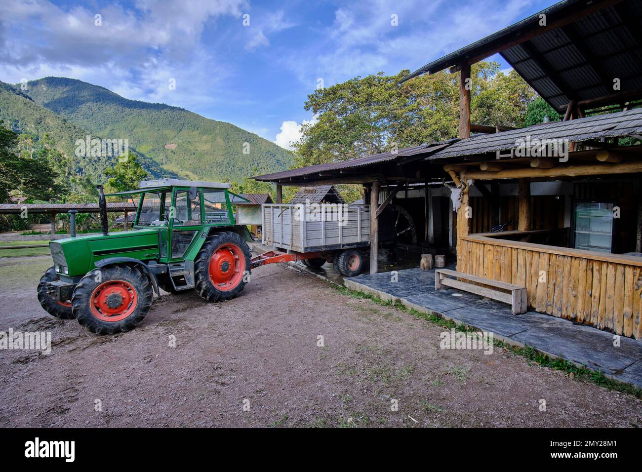 Old tractor used in the jungle for agricultural activities related to sugar cane. Stock Photo