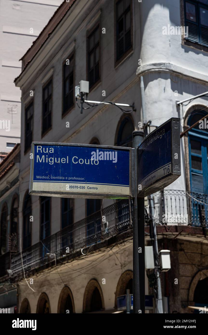 A blue street name sign of Miguel Couto street at the corner with ...