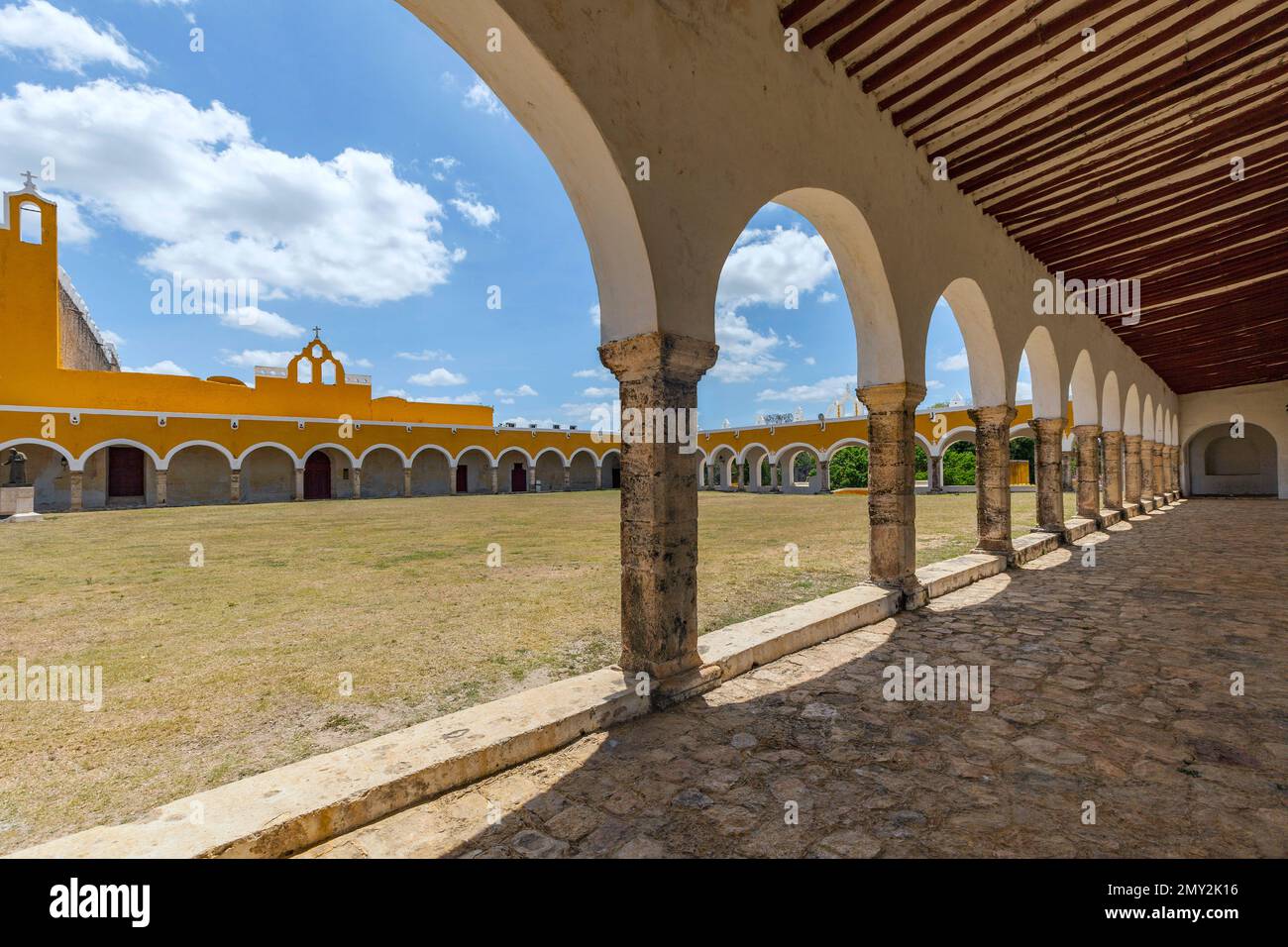 Arches and Atrium of the Monastery of San Antonio de Padua in Izamal, Yucatan, Mexico Stock Photo