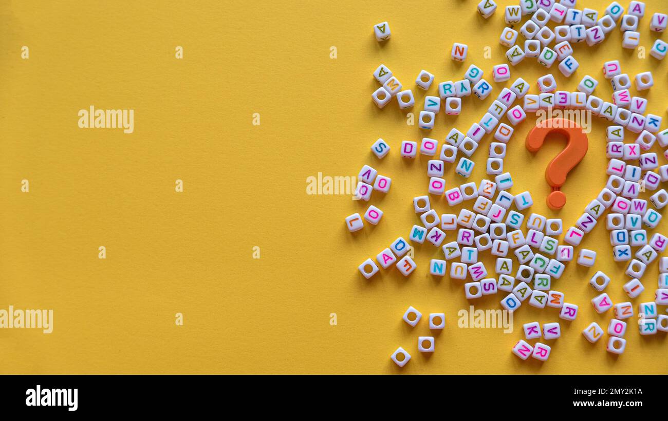 Questions and answers concept. Question symbol and alphabet beads on