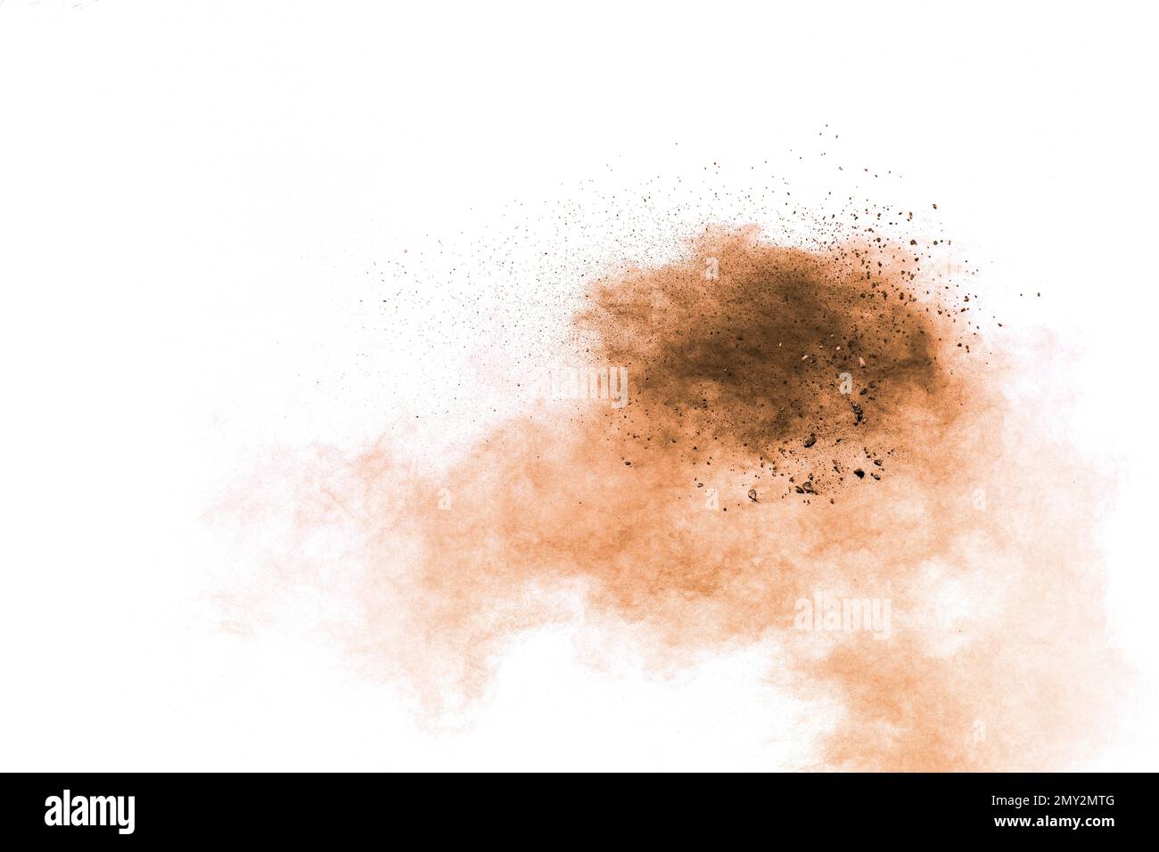 Freeze motion of brown dust explosion on white background.Stopping the movement of brown powder. Stock Photo