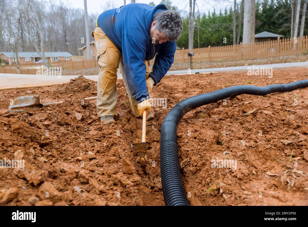 It is dig trench to lay drainage pipes during heavy downpours in order