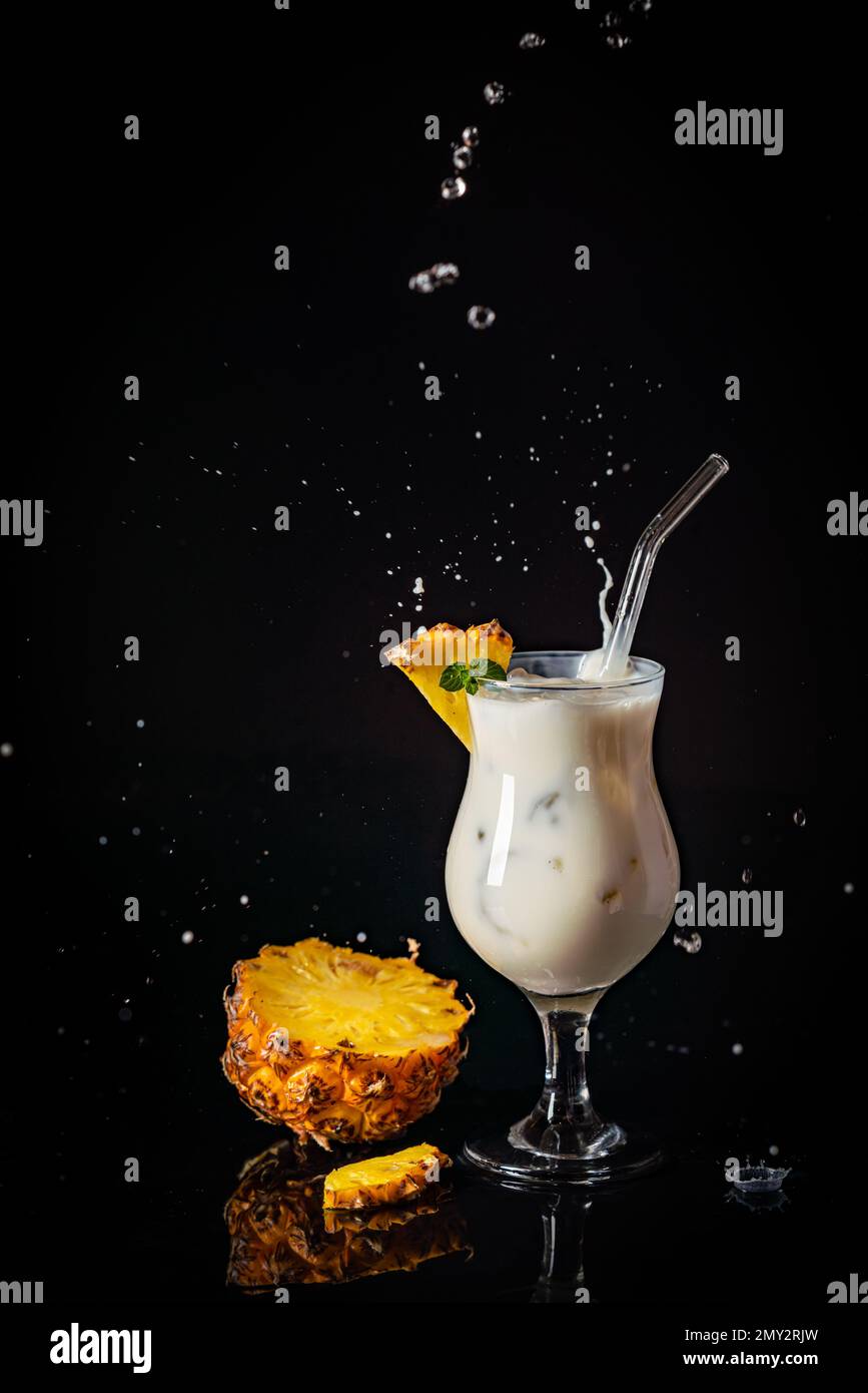 Traditional caribbean summer Pina Colada cocktail with rum, coconut