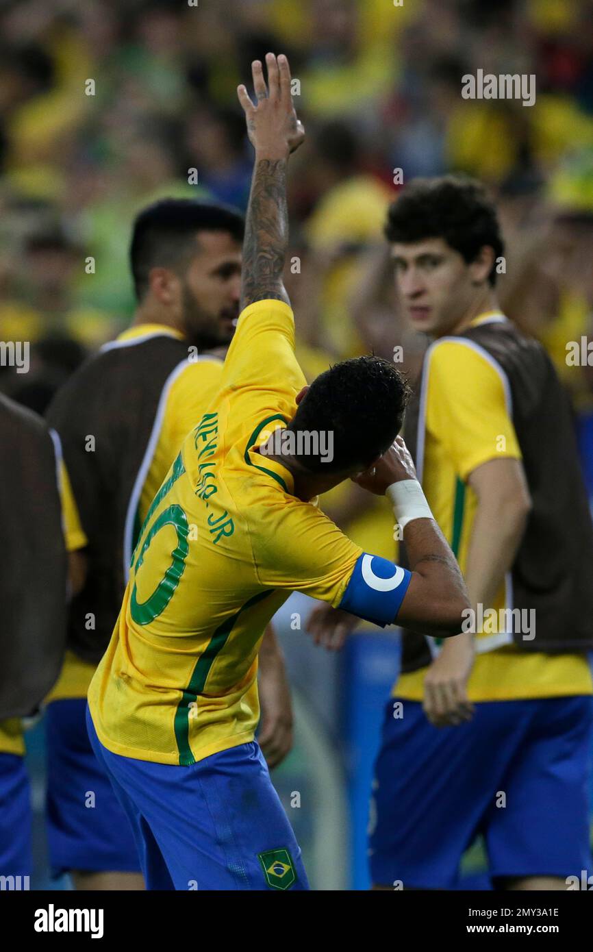 Brazil's Neymar celebrates scoring his side's first goal during the ...