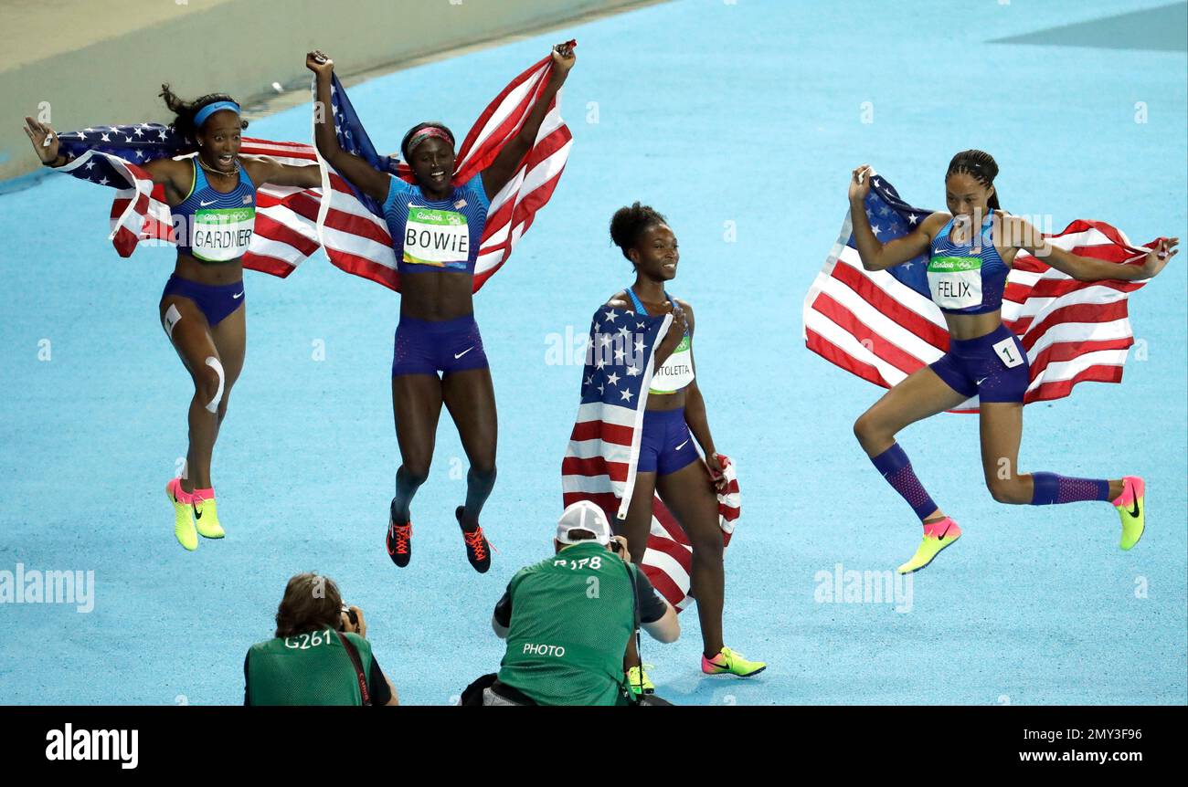 The United States team from left, English Gardner, Tori Bowie, Tianna