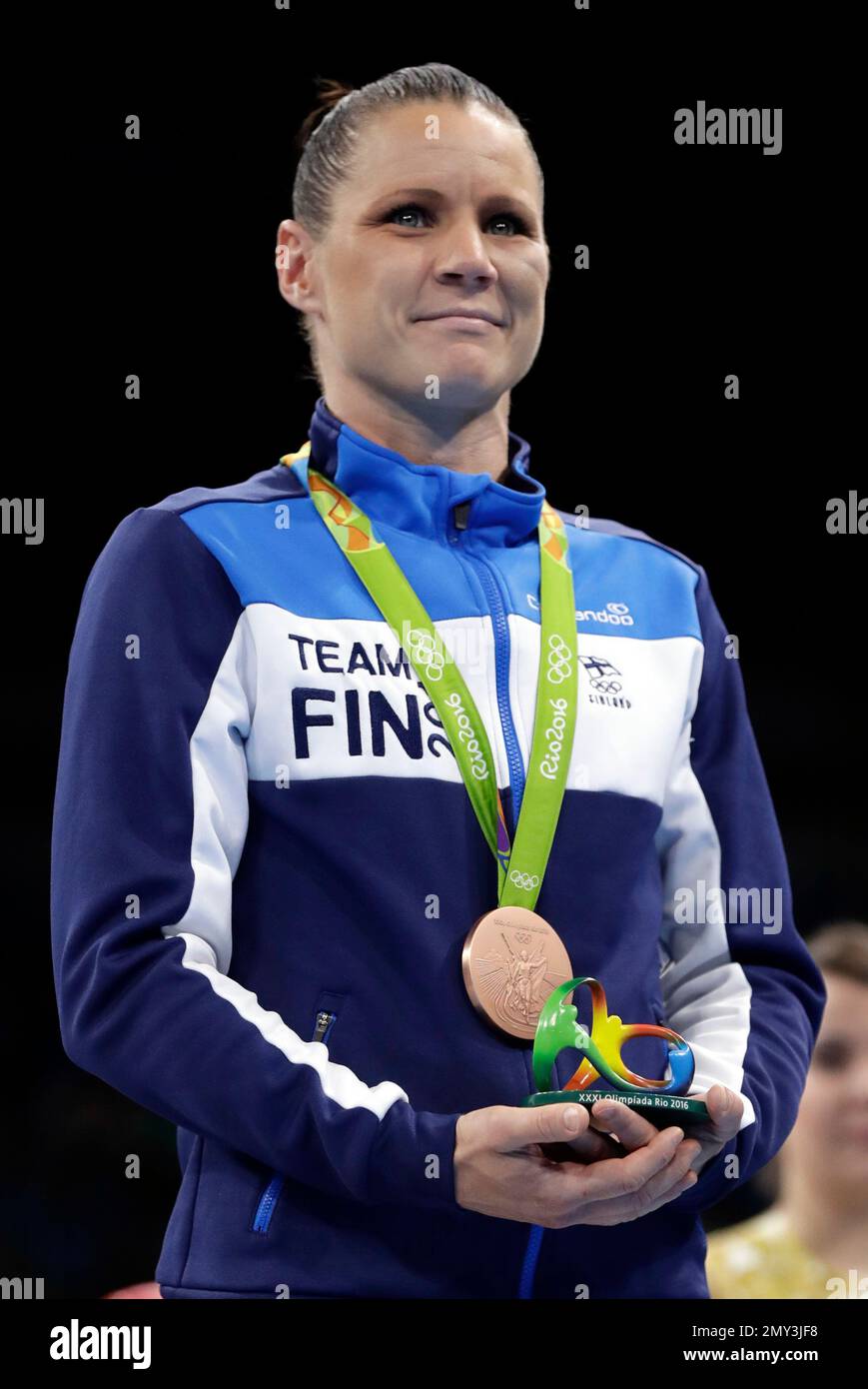 Finland's Mira Potkonen displays her bronze medal for the women's