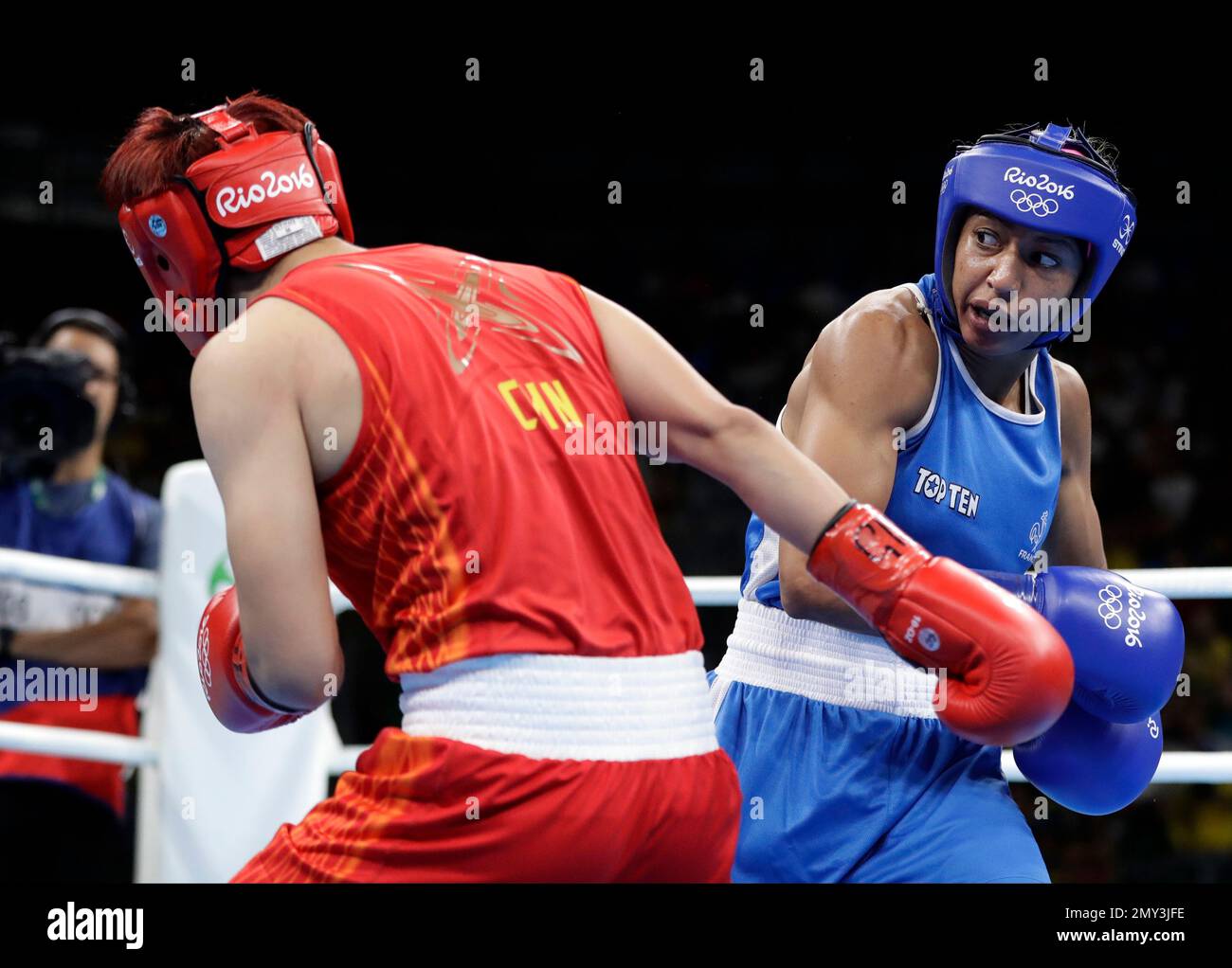 France's Estelle Mossely, right, fights China's Yin Junhua during a