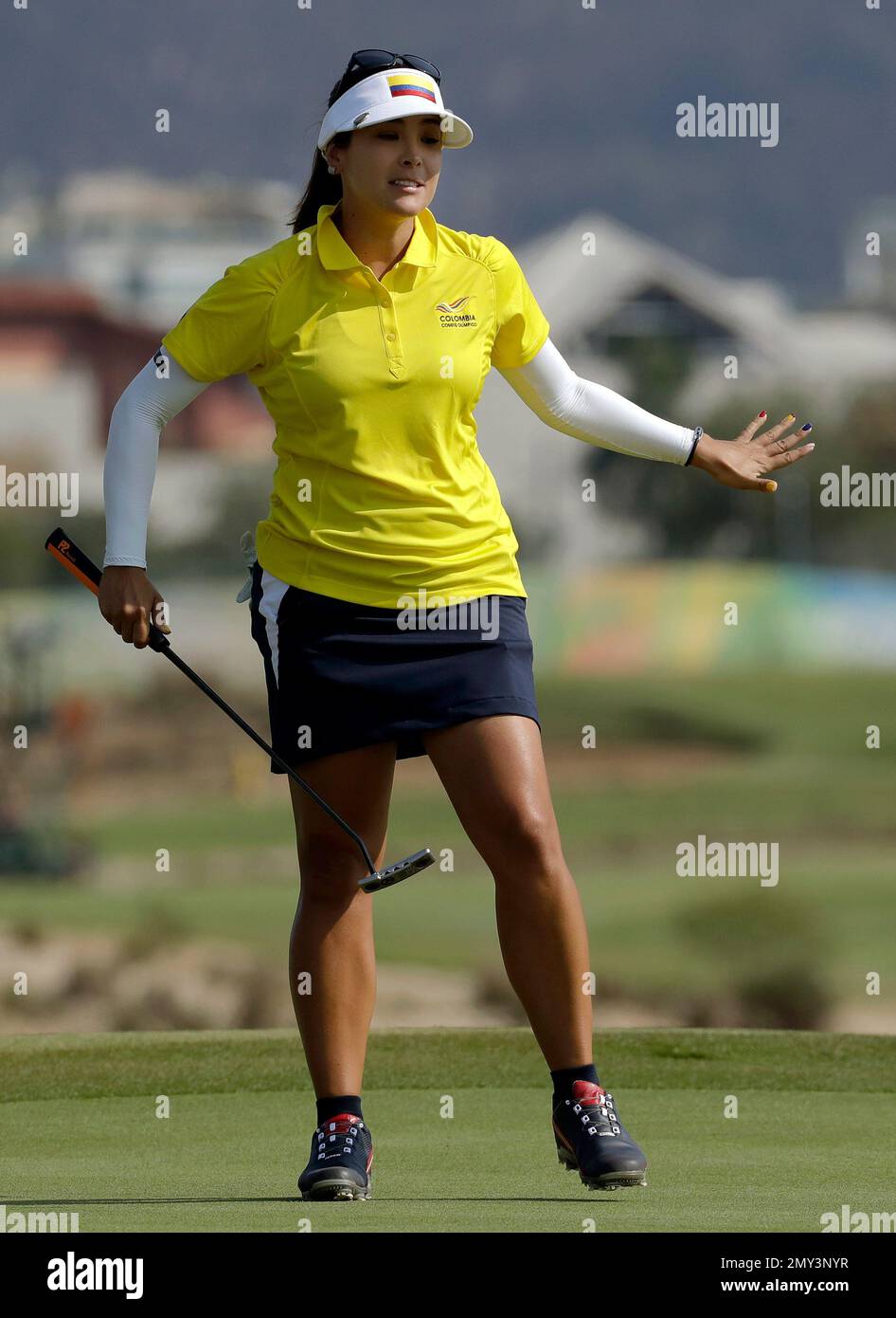 Mariajo Uribe of Colombia, reacts to missing a birdie putt on the 3rd