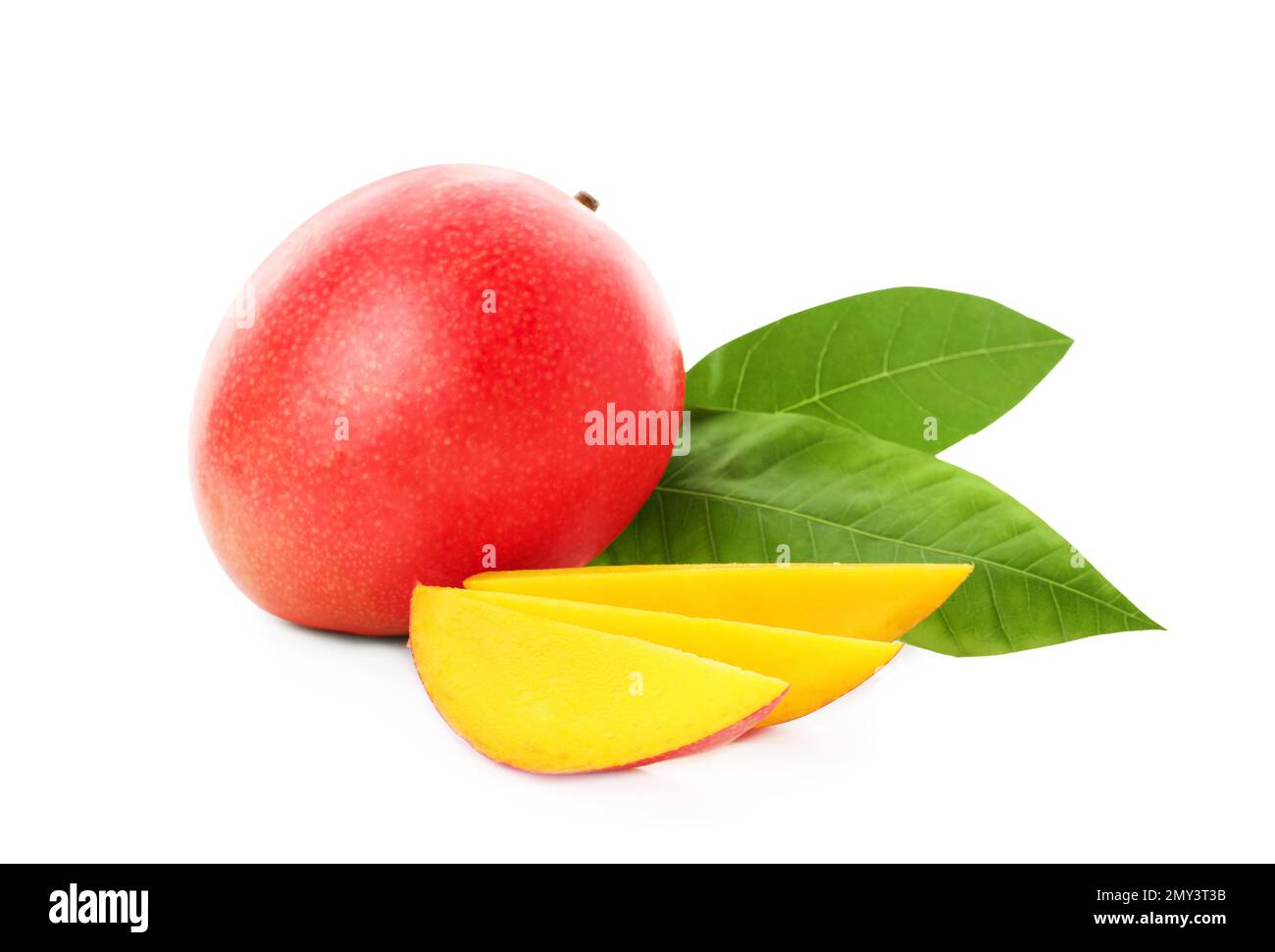 Whole and cut ripe mangoes isolated on white. Exotic fruit Stock Photo ...