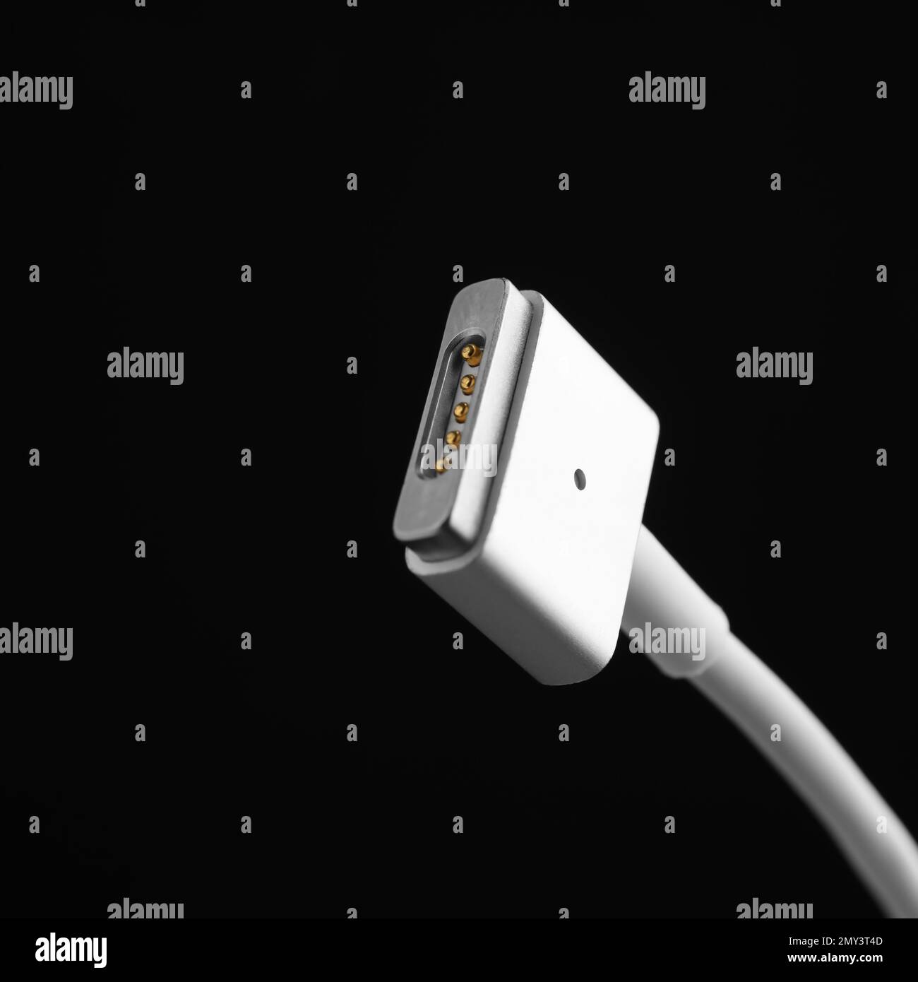 Charge cable on black background, closeup. Space for text Stock Photo