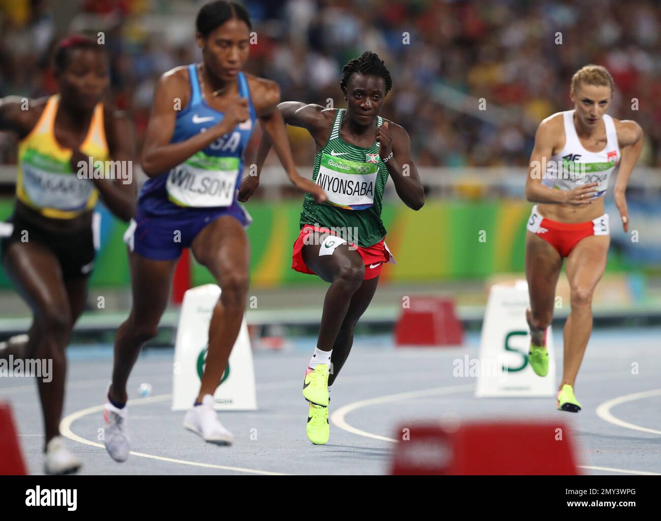 Burundi's Francine Niyonsaba, second right, competes in a women's 800