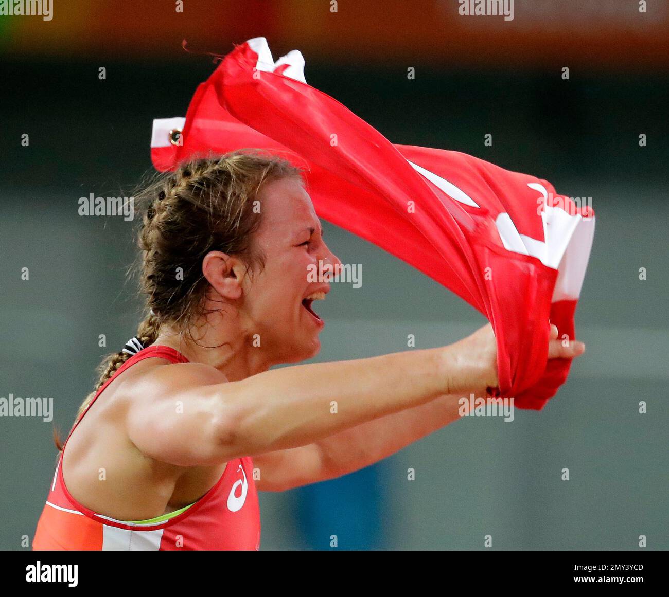 Canada's Erica Elizabeth Wiebe celebrates after beating Kazakhstan's Guzel  Manyurova for the gold in the women's wrestling freestyle 75-kg competition  at the 2016 Summer Olympics in Rio de Janeiro, Brazil, Thursday, Aug.