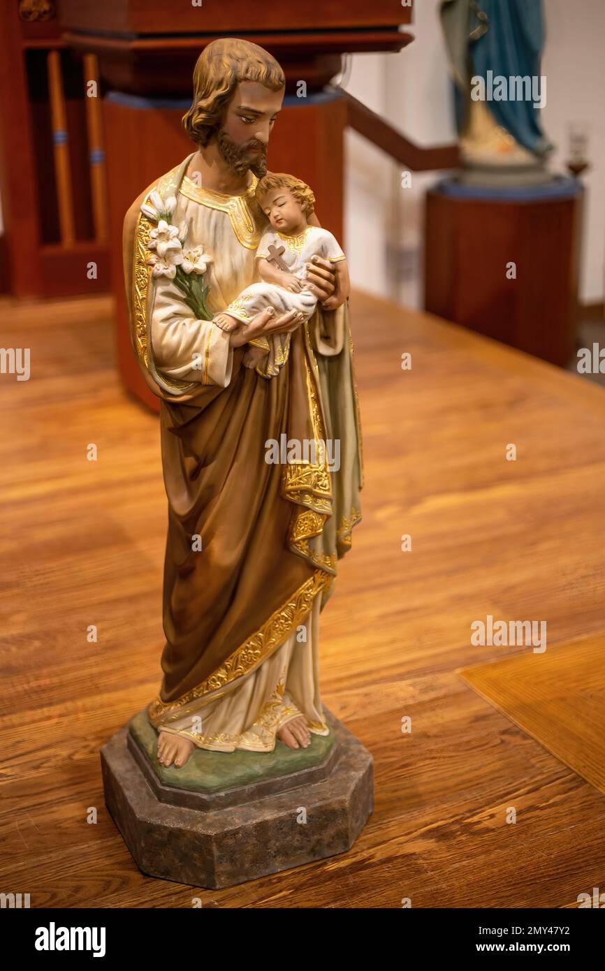 Statue of St. Joseph holding the baby Jesus at St. Joseph