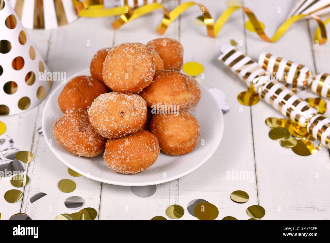 German traditional 'Berliner Pfannkuchen', a donut without hole filled with jam. Traditional served during carnival Stock Photo