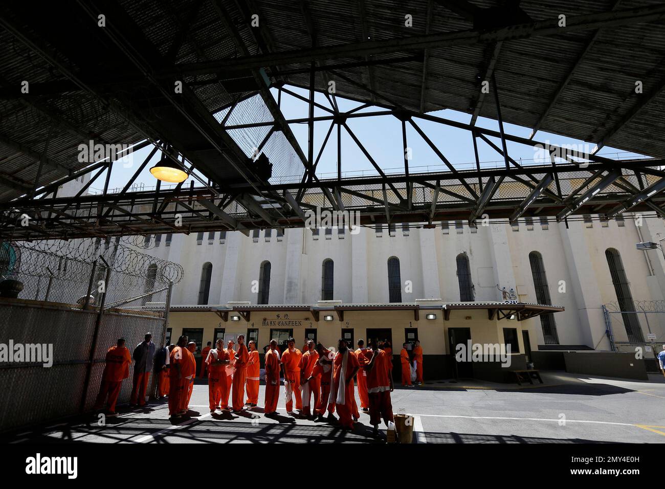 General population inmates stand near the main canteen store at San Quentin State Prison Tuesday