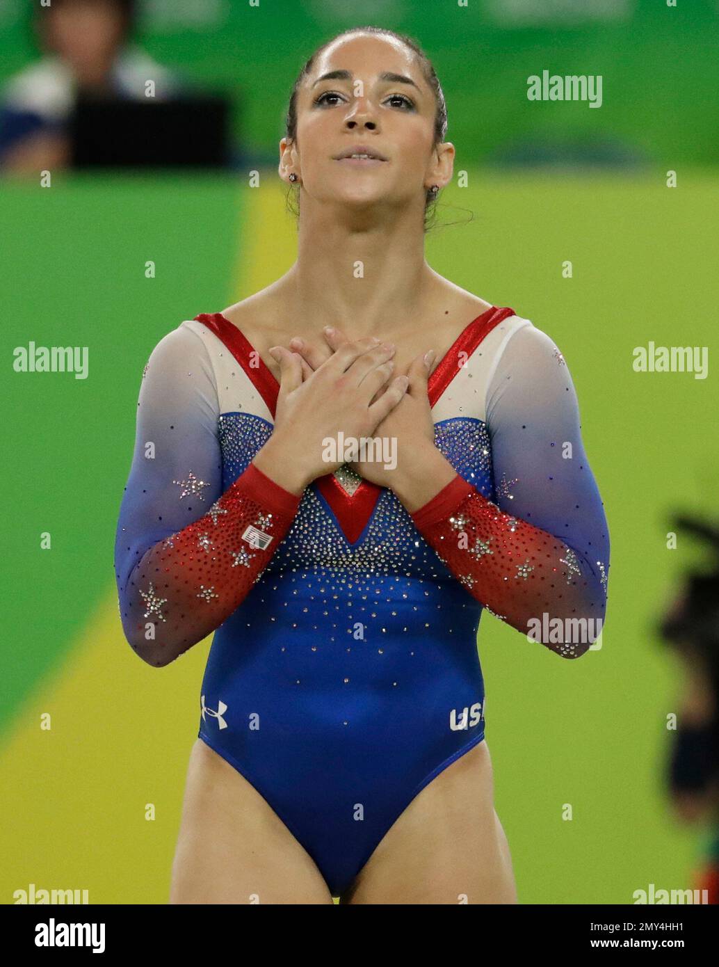 United States' Aly Raisman completes her routine on the floor during ...