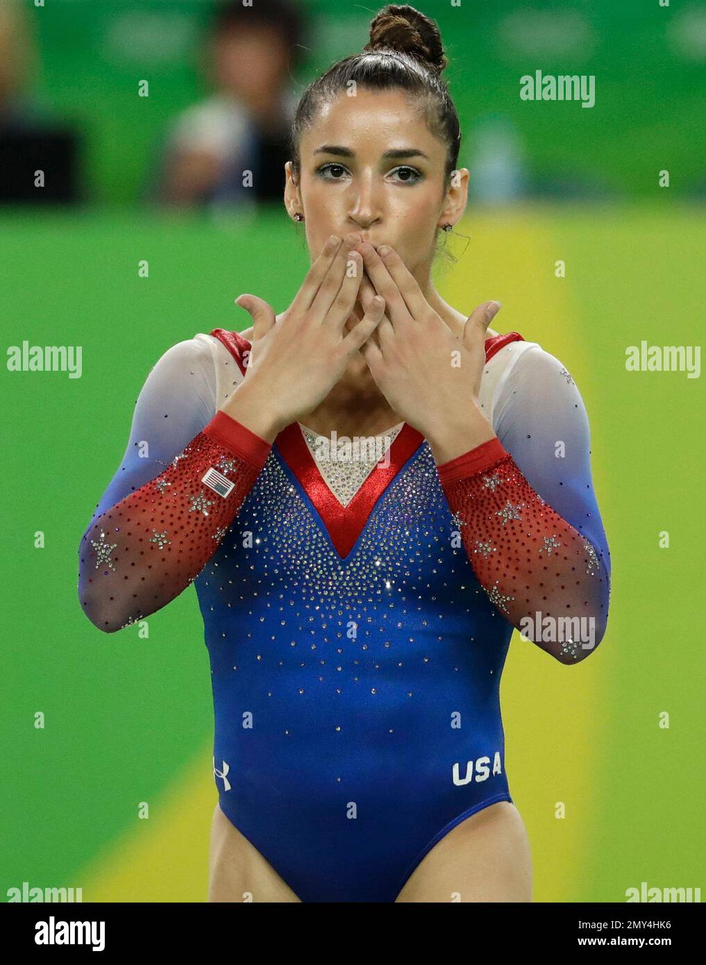 United States' Aly Raisman completes her routine on the floor during ...