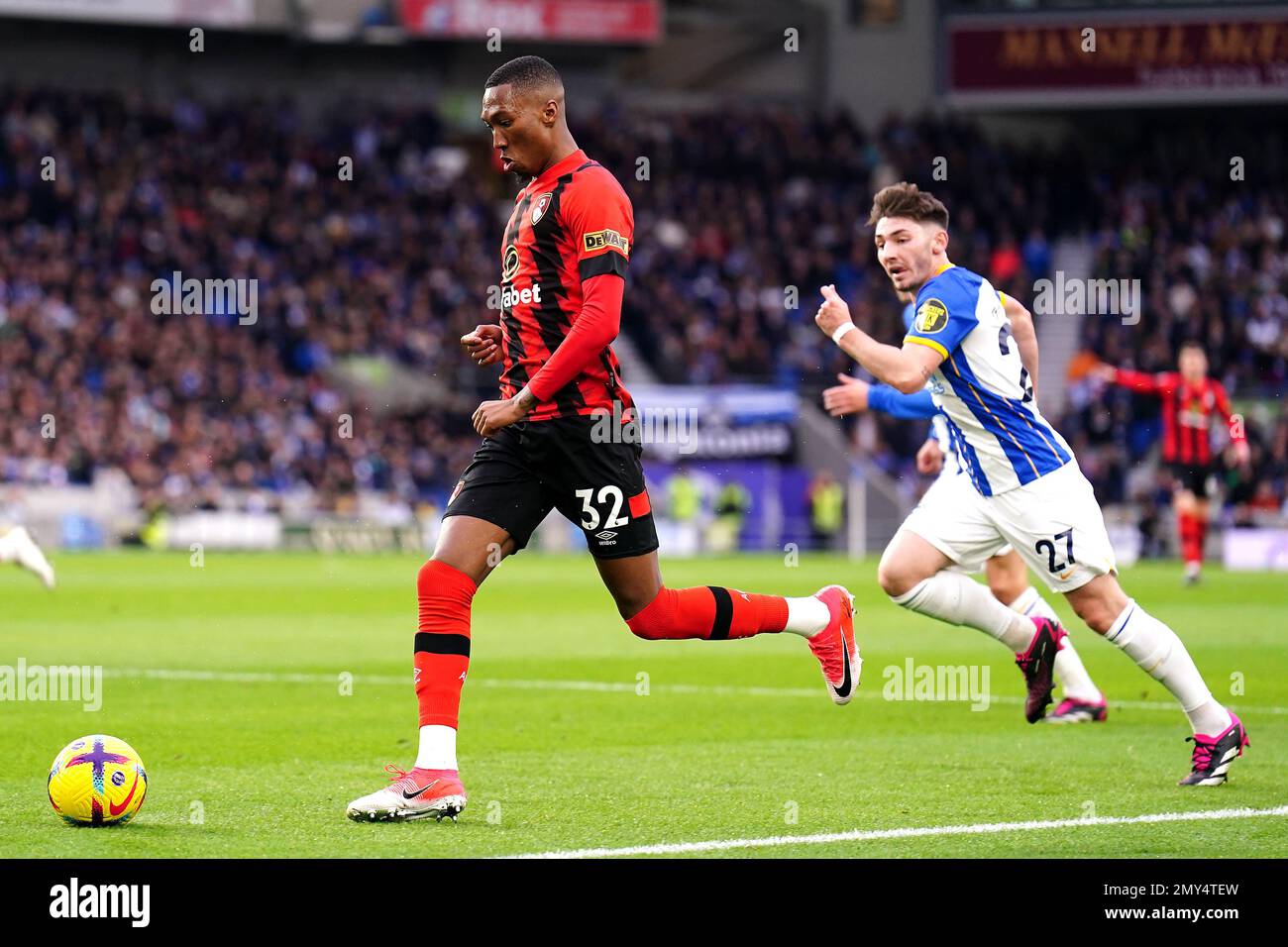 Bournemouth's Jaidon Anthony (left) and Brighton and Hove Albion's Billy Gilmour battle for the ball during the Premier League match at the Amex Stadium, Brighton and Hove. Picture date: Saturday February 4, 2023. Stock Photo