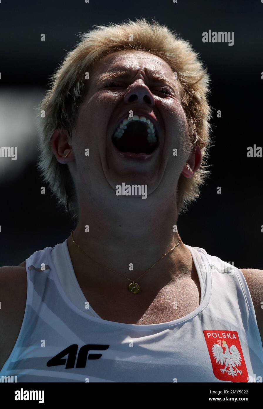 Poland's Anita Wlodarczyk celebrates her world record throw in the